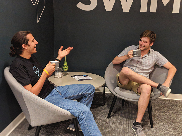 Swimlane Interns Chatting over Coffee
