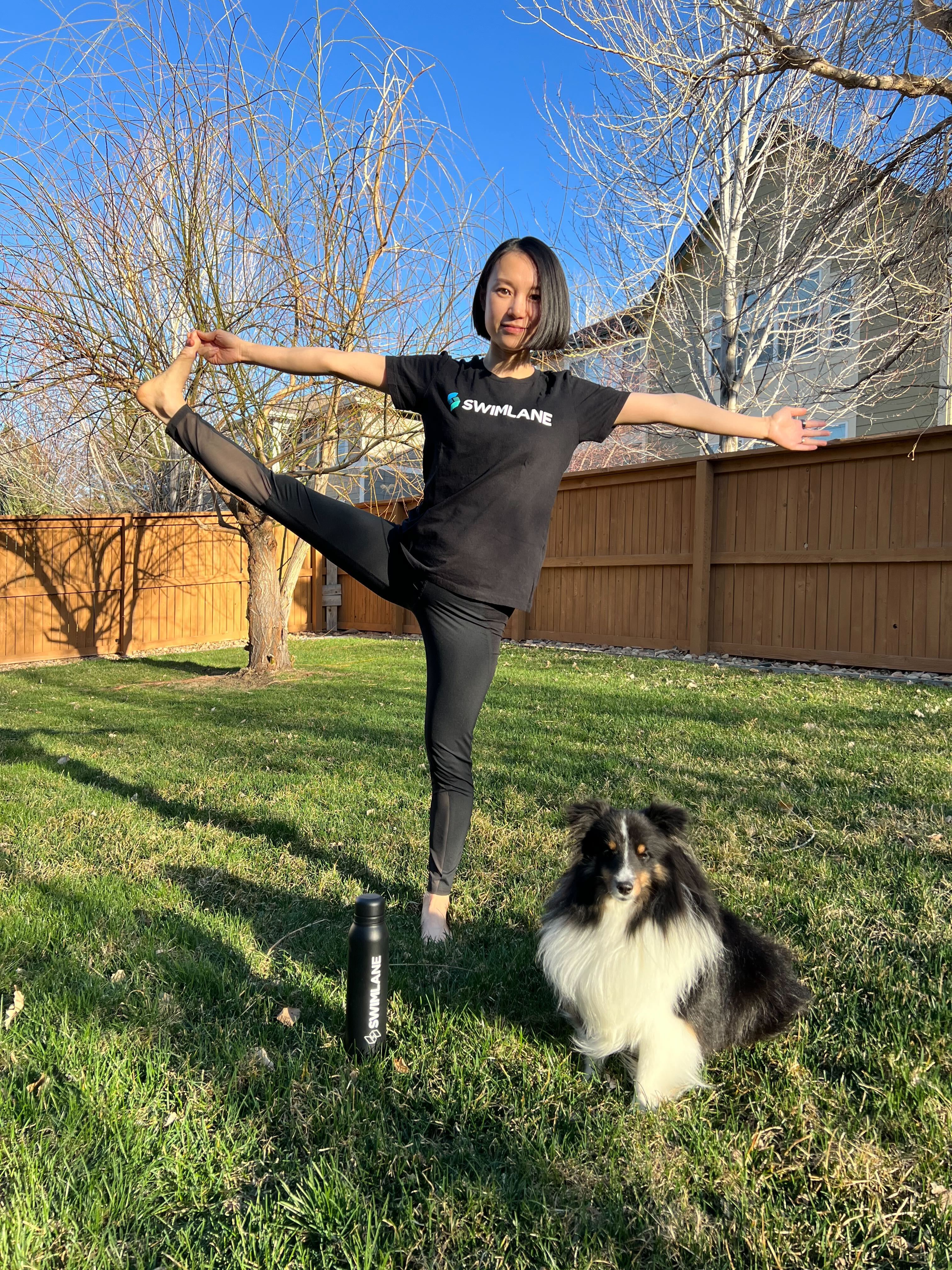 Xiaomei does backyard dog yoga.