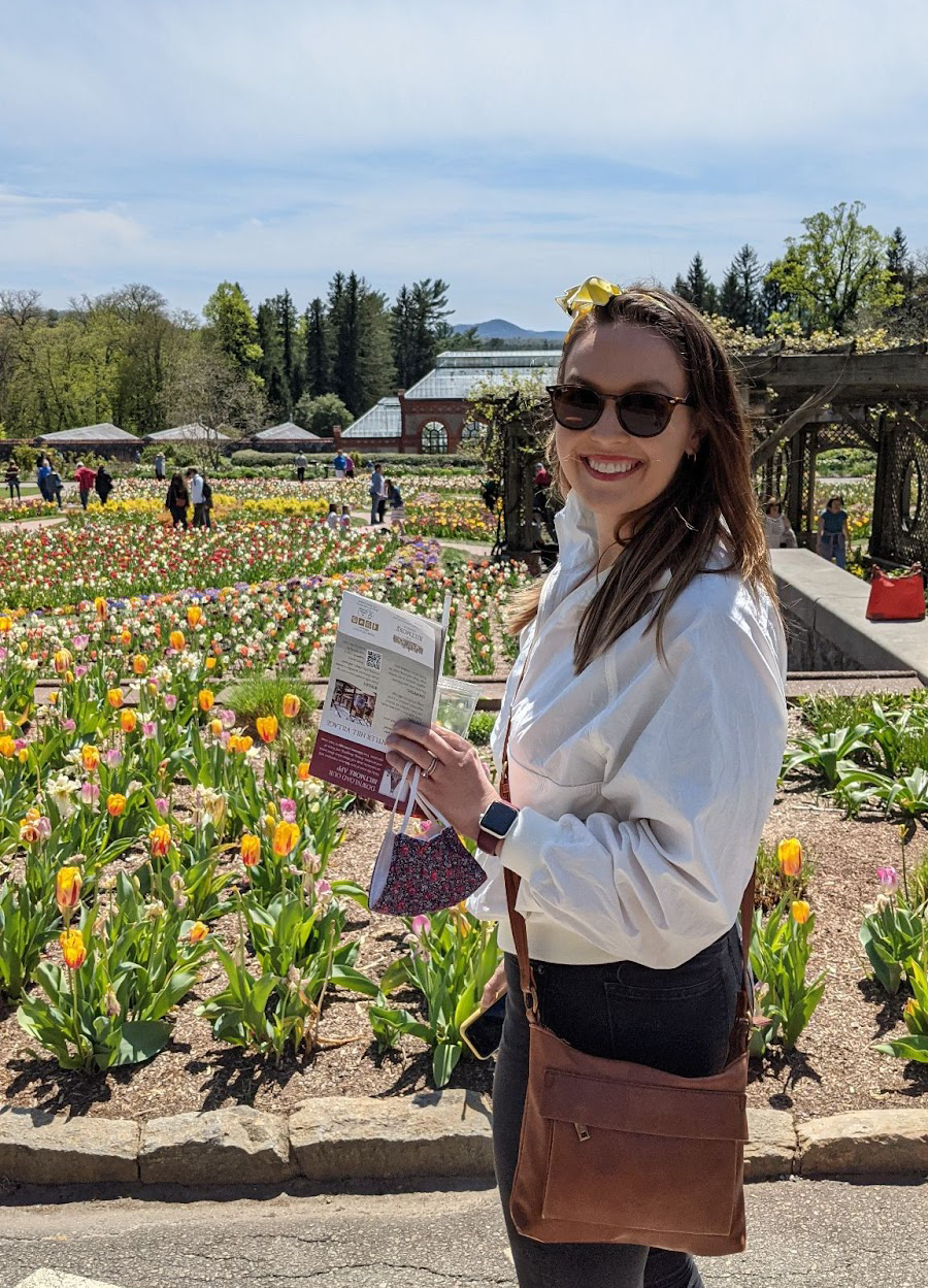 Director of Product Marketing, Katie, enjoys a flower garden